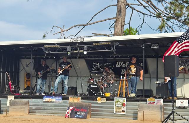 Summer festival stage, flag flying